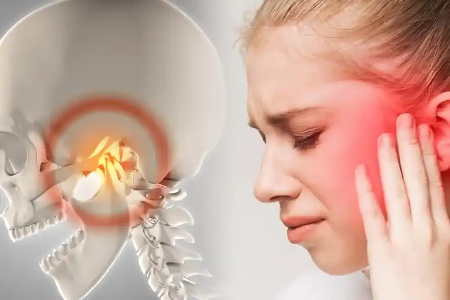 Ilustração de dor na região do siso e articulação temporomandibular — sintomas que indicam avaliação para extração em Curitiba